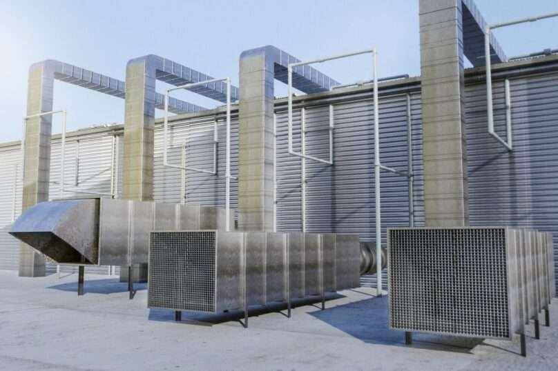 Industrial HVAC ventilation system installed on a commercial building rooftop showing air ducts and exhaust units — JD Engineers & Consultants.