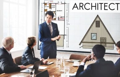 What Are Architectural Design Services and Why Your Project Needs Them Architect presenting building design plans during a client meeting, illustrating architectural design and planning process — JD Engineers & Consultants.